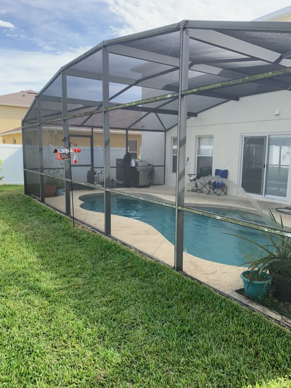A re-screened porch enclosure completed by All Discount Screen Repair